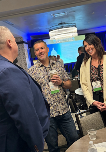 Photo - Woman standing in front of government building