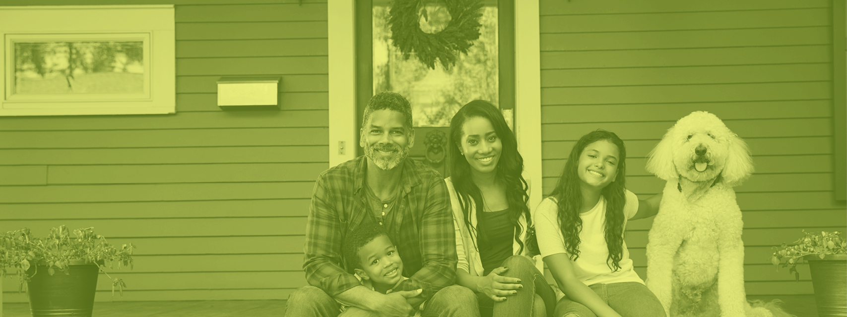 Convergence banner - photo of young family infront of home